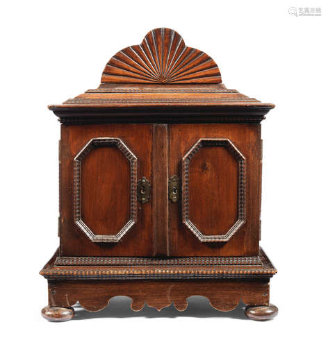 17th century and later A South German walnut table cabinet