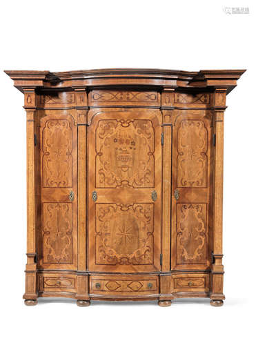 A South German 18th century serpentine walnut, burr walnut, fruitwood and marquetry schrank