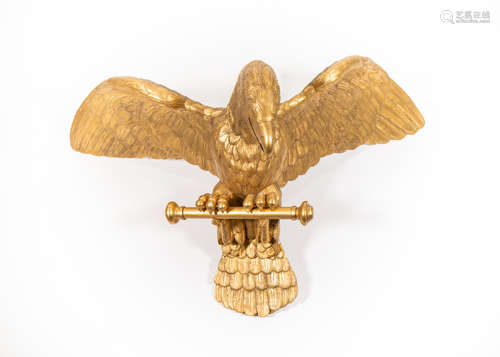 A French early 19th century carved giltwood Imperial Eagle