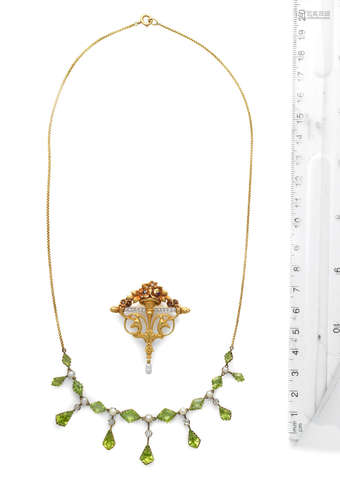 (2) An Art Nouveau diamond brooch/pendant and a peridot fringe necklace, circa 1900