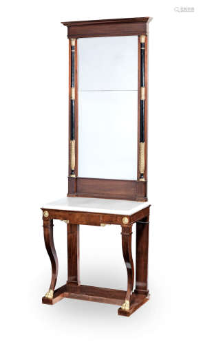 In the Empire style A French 19th century mahogany and parcel gilt pier table and matched mirror