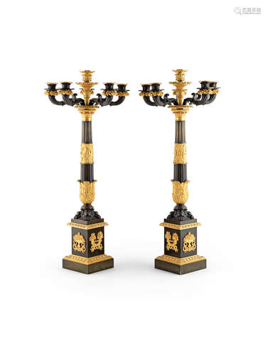 A large pair of French 19th century patinated and gilt bronze five-light candelabra