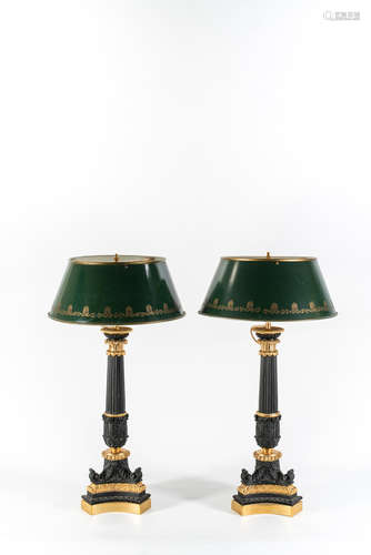 In the Empire style A large pair of French 19th century gilt and patinated bronze candlesticks