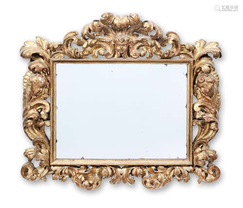 A Florentine 19th century carved giltwood mirror