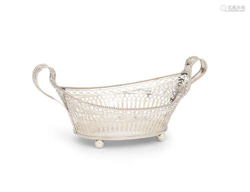 with pseudo 18th century Dutch marks, and later Dutch hallmarks  A pierced silver basket