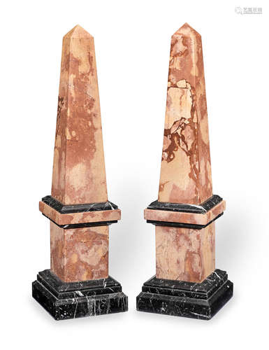 A large pair of marble obelisks