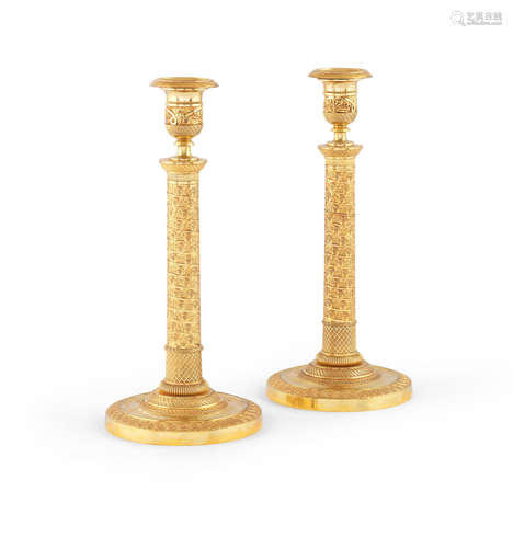 A pair of French 19th century gilt bronze candlesticks