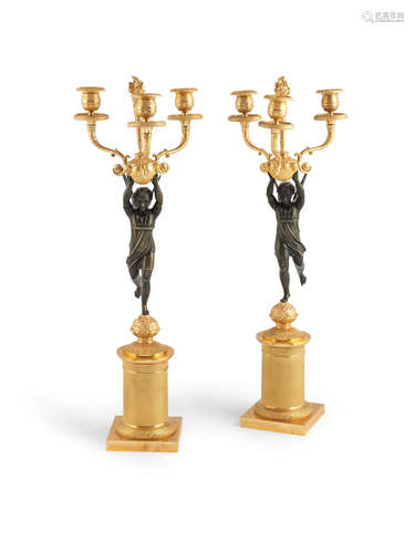 Probably Restoration A pair of French 19th century gilt and patinated bronze candelabra