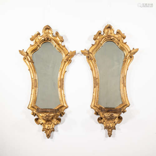 Early 19th century A pair of North Italian carved giltwood mirrors