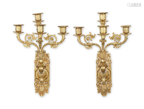 Two pairs of French gilt-bronze and gilt-metal wall lights