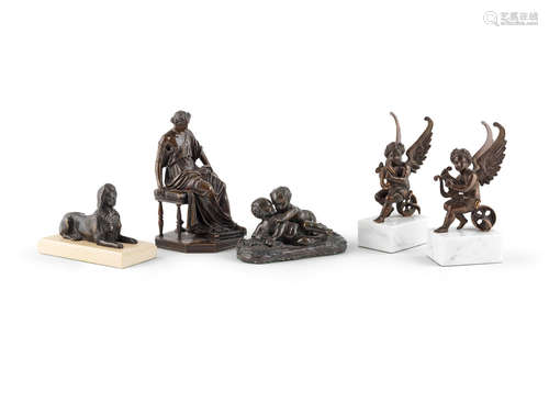 A collection of bronze groups, including a French bronze figure of a seated lady in Classical dress, cast by Barbedienne