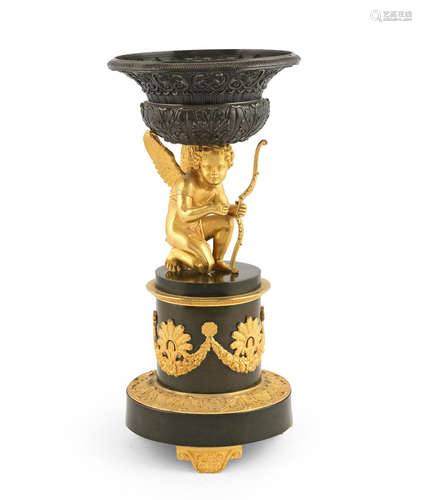 A 19th century French patinated and gilt bronze mounted tazza