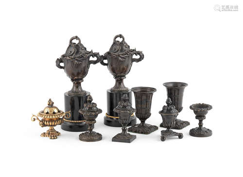 A collection of nine small 19th century urns and pastille burners,