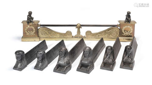 Three pairs of French early 20th century cast iron andiorns in the form of Sphinx