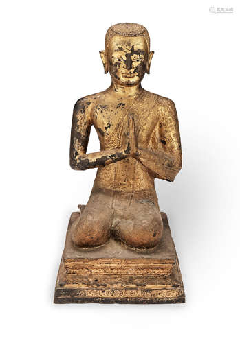 20th century A gilt-bronze figure of a Thai monk