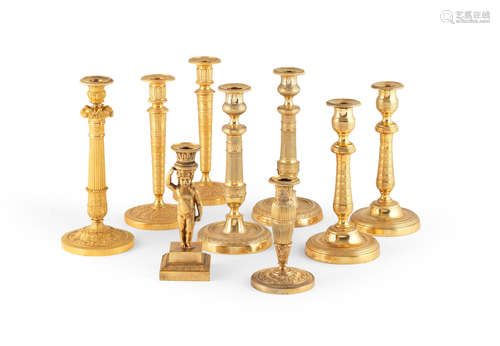 Three pairs of French 19th century gilt-bronze candlesticks