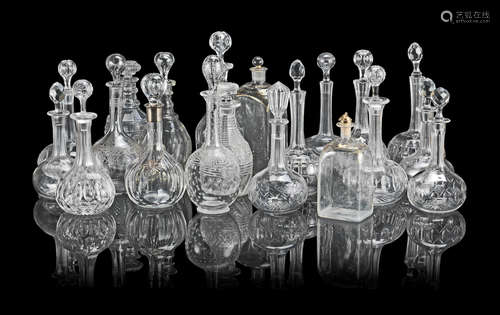 A collection of cut glass decanters