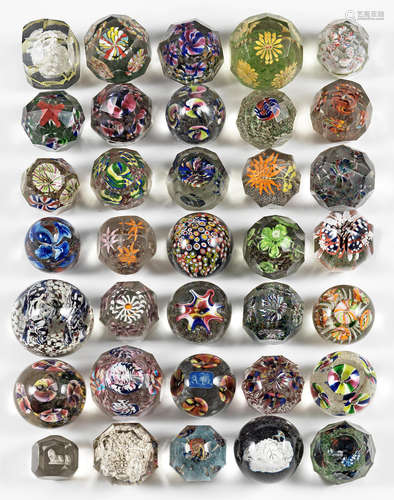 19th and 20th century  A collection of thirty five Bohemian and Art glass paperweights