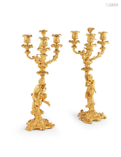 In the Rococo style A pair of French 19th century gilt-bronze candelabra