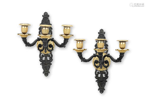 A pair of 19th century bronze and gilt-bronze three branch wall lights