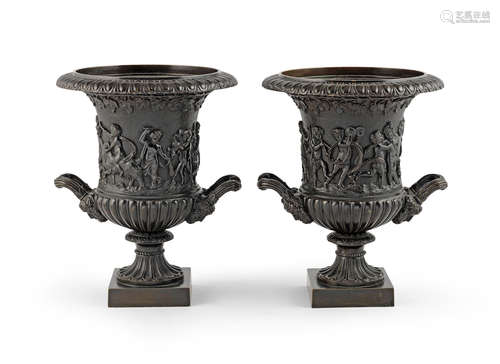 A pair of 19th century French bronze campagna style urns