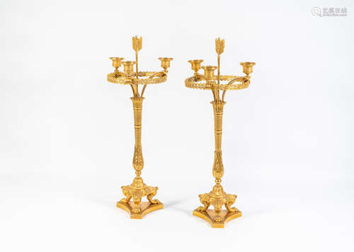 A pair of French 19th century gilt-bronze three light candelabra