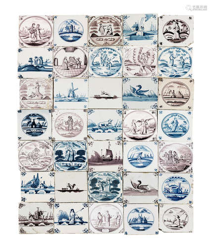 A large collection of Delft tiles, mostly 19th century