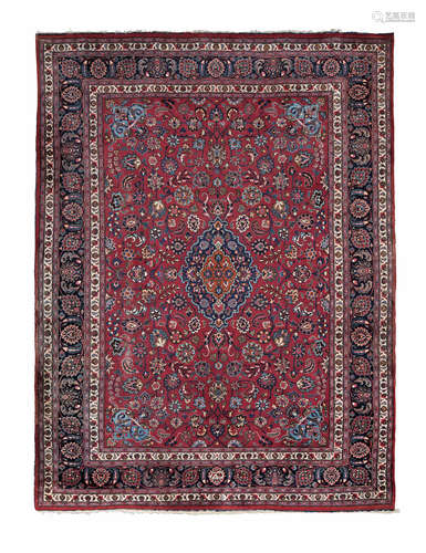 North East Persia 390cm x 299cm (153 1/2in x 117 1/2in) A Meshed carpet