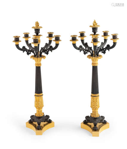 A large pair of French 19th century patinated and gilt-bronze candelabra