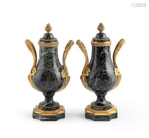 In the Louis XVI style A pair of French 19th century green serpentine and gilt-bronze mounted urns