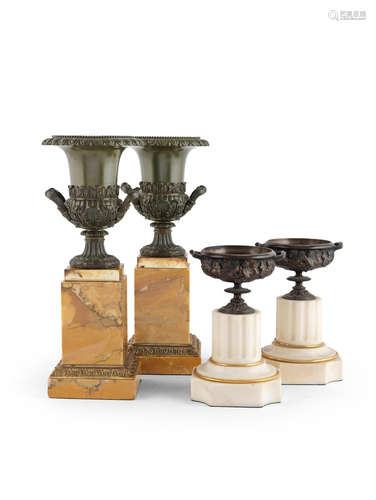 A pair of 19th century patinated bronze and marble campagna style urns