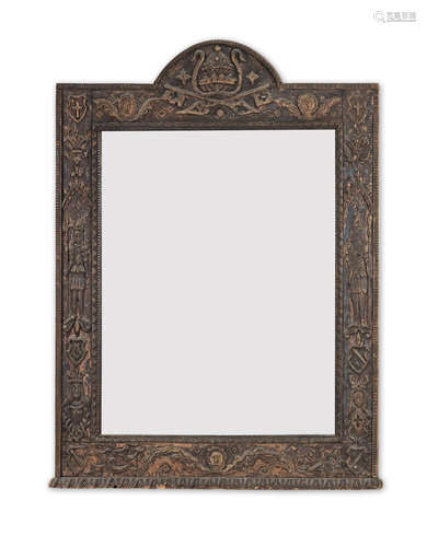 A Gothic revival carved and stained pine mirror