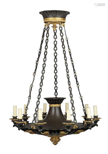 In the Empire style A fine French 19th century patinated and gilt bronze ten light 'colza' chandelier