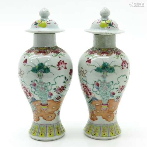 A Pair of Famille Rose Garniture Vases