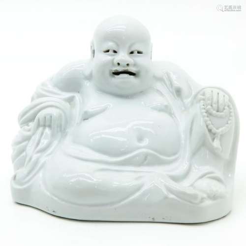 A Blanc de Chine Buddha Sculpture
