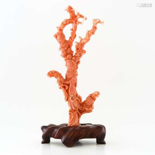 A Carved Red Coral Sculpture