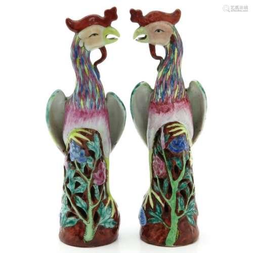 A Pair of Polychrome Decor Sculptures