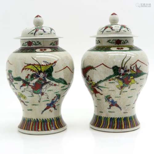 A Pair of Temple Vases with Covers