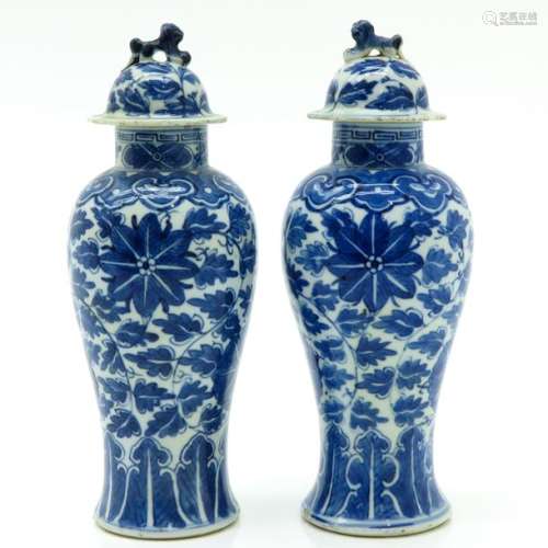 A Pair of Garniture Vases
