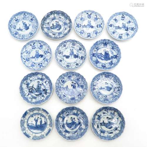 A Lot of 13 Blue and White Saucers