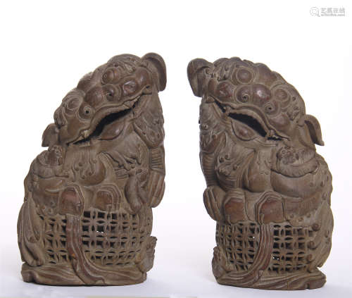 PAIR OF CHINESE BAMBOO CARVED LIONS