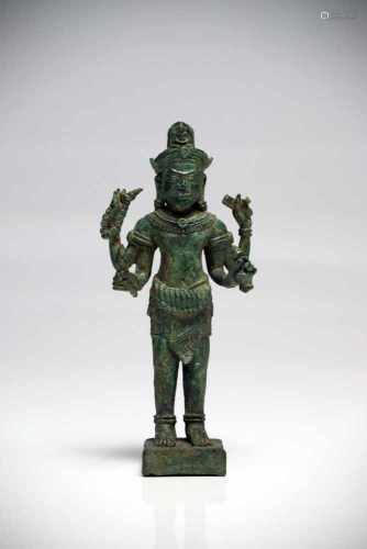 LokeshvaraBronzeCambodia12th ctH: 15 cmThis four-armed lokeshvara is holding a lotus bud, a bumpa,