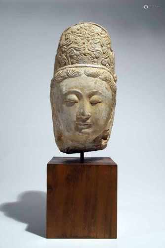 Head of GuanjinStoneChina12th ctH: 30 cmThis beautifully modeled head of a Guanyin shows the