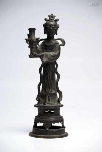 Woman with VaseBronzeChina16th ctH: 29 cmA noble lady standing on a round platform in a long robe, a
