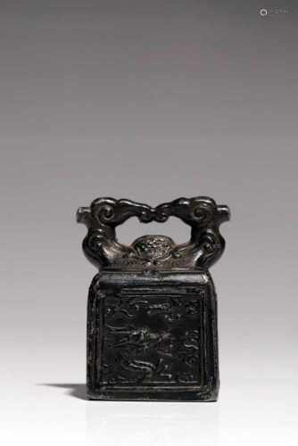 SealTinChina18th ctH: 8 cmA Chinese seal stamp made of tin. The sides are decorated with a