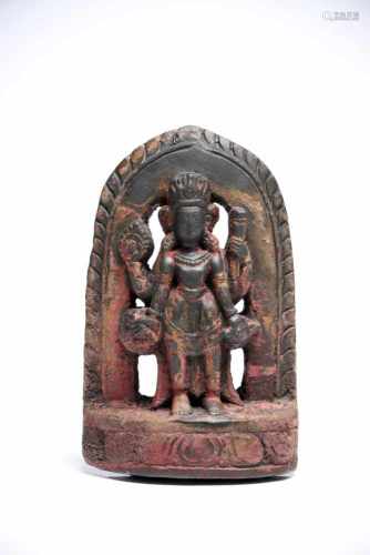 Standing VishnuStoneNepal / Newar16th ctH: 13 cmA four-armed Vishnu standing on a lotus base with
