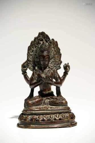ShadakshariBronzeTibet19th ctH: 16 cmAvalokiteshvara Shadakshari sitting in padmasana (lotus pose)