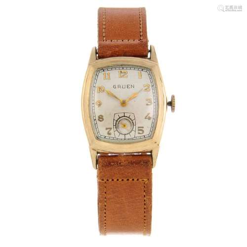 GRUEN - a mid-size wrist watch. Gold plated case with