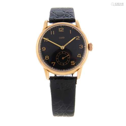 CORD - a gentleman's wrist watch. Yellow metal case,