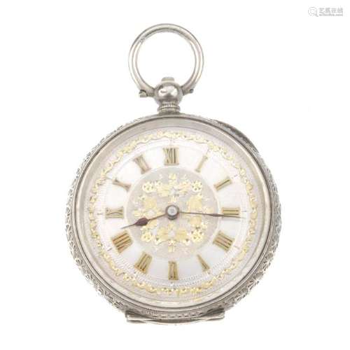 An open face fob watch. White metal case, stamped 0,935